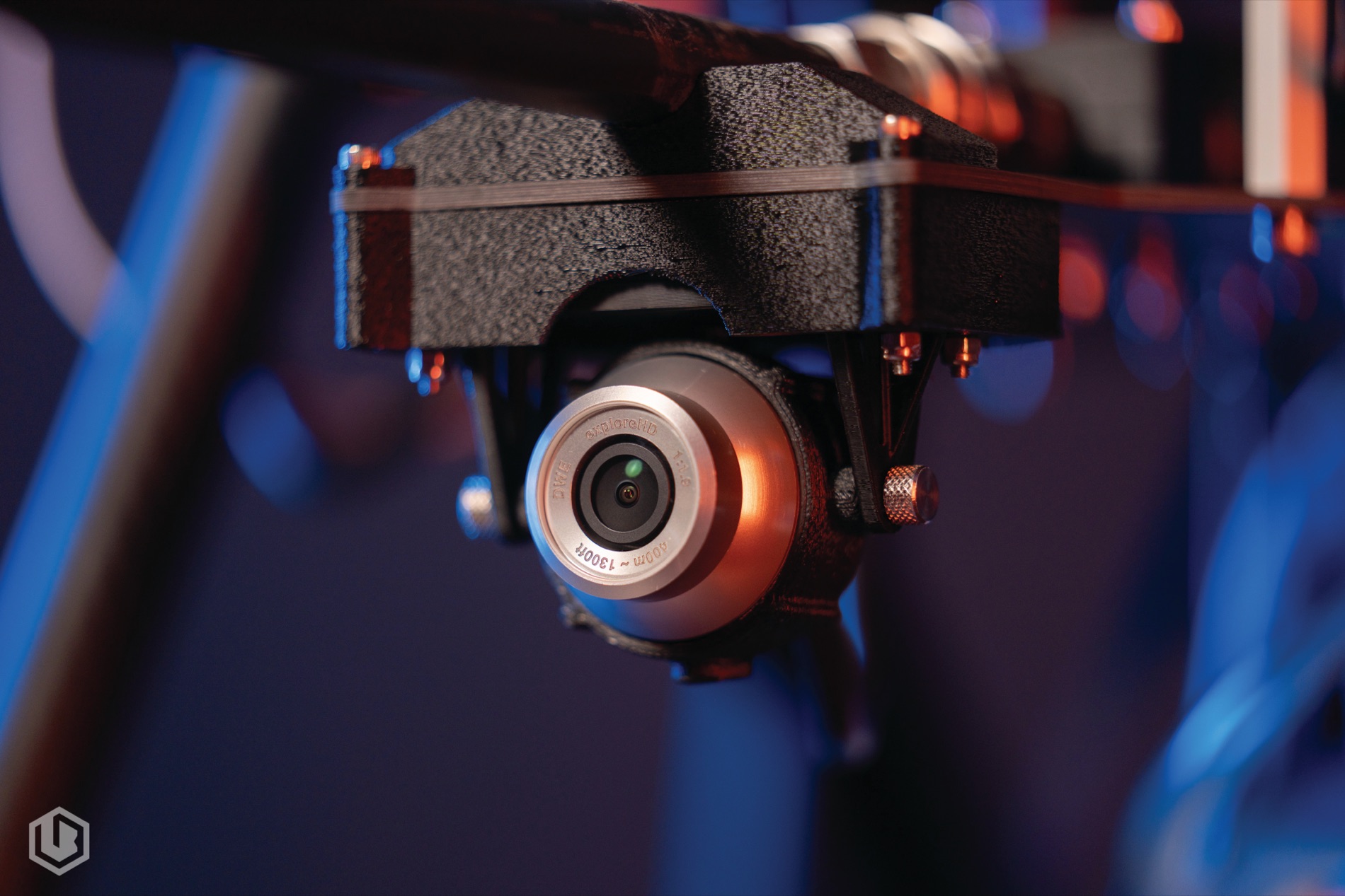 Close detail of the cleaning drone's camera and spray head
